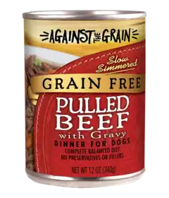 A 12 oz can of Aloha Tuna with Crab & Seaweed dog food, labeled as a complete balanced diet with no preservatives or fillers.