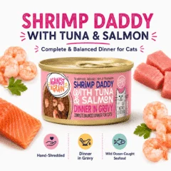 A can of Shrimp Daddy with Tuna & Salmon cat food appears alongside raw tuna, salmon, and shrimp. Icons show hand-shredded texture, a savory gravy dinner, and wild ocean-caught seafood ingredients.