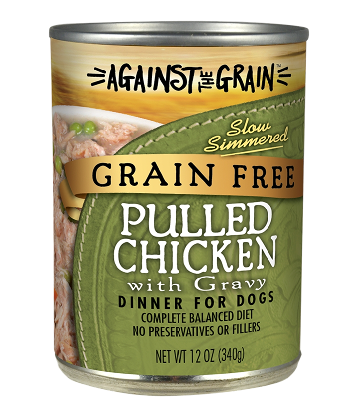 A can of Against the Grain Grain Free Pulled Chicken with Gravy dinner for dogs, 12 oz, labeled as slow simmered and containing no preservatives or fillers.